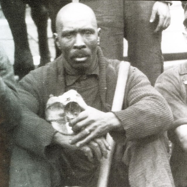 black and white photo of an African American coal miner
