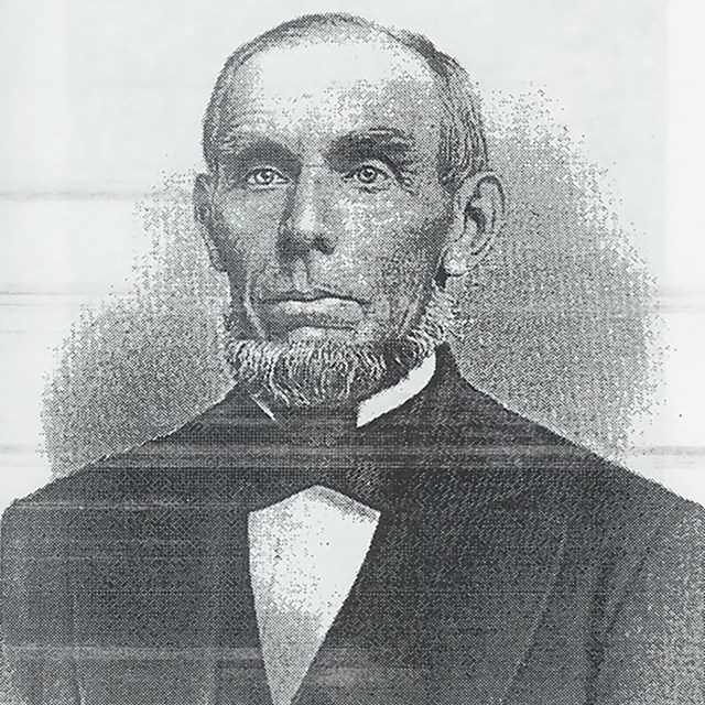 Drawing of an older man with short bear in an 1800s style suit