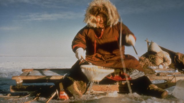 Inupiaq people fishing in the winter