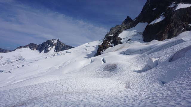 steep mountain covered in ice and snow