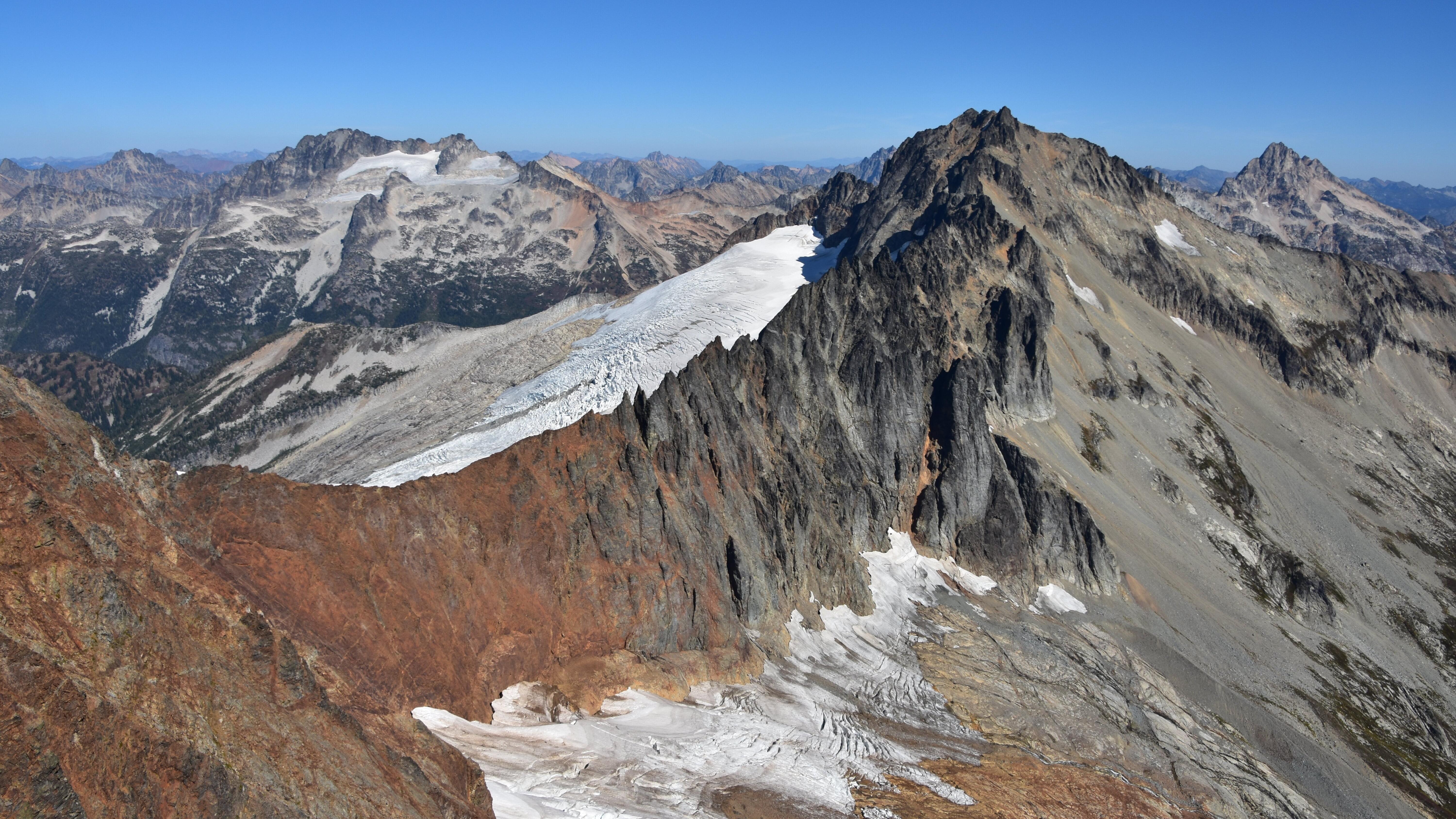 rocky mountain with glaciers in the foreground