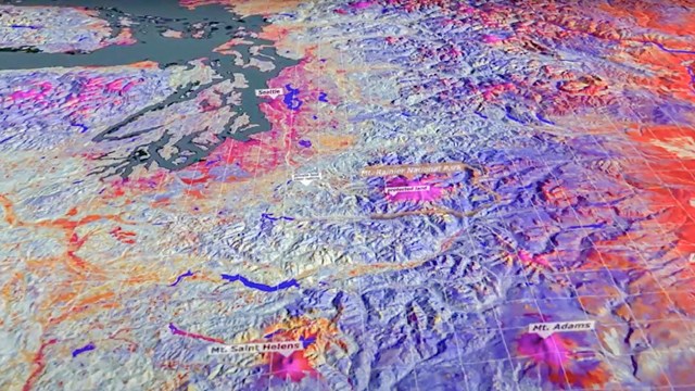 A colorful map of the Pacific Northwest using non-visible wavelengths taken from a satellite.