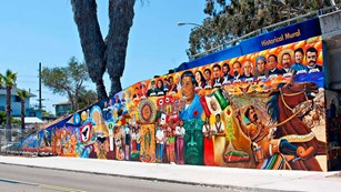 Latino-themed mural on a street