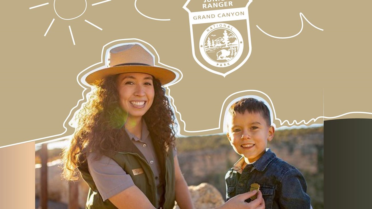 Small child stands in air hanger museum wearing junior ranger hat and badge.