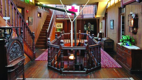 A highly decorated large stairwell and hallway area
