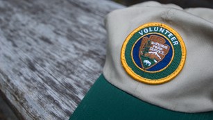 NPS volunteer patch on a hat