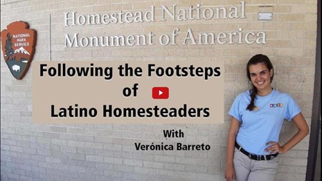 Video preview image of an intern standing next to a visitor center entrance