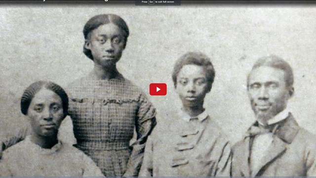Screenshot of a video showing a historical portrait of a family 