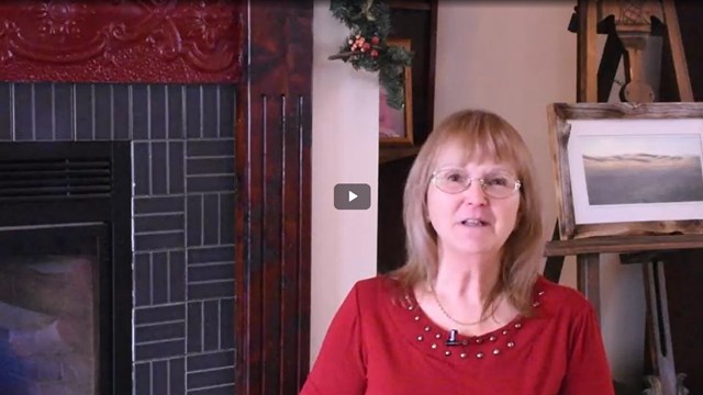 Video screenshot of a person talking