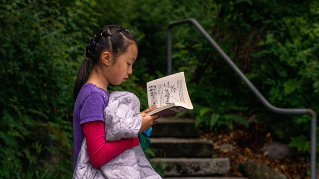 Kid coloring a face mask