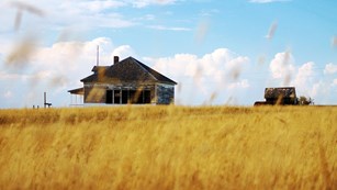 Small wooden school house on a prairie