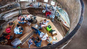 Aerial view of vendors in a circular room