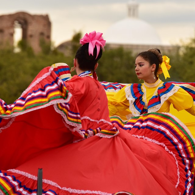 Two folklorico dancers