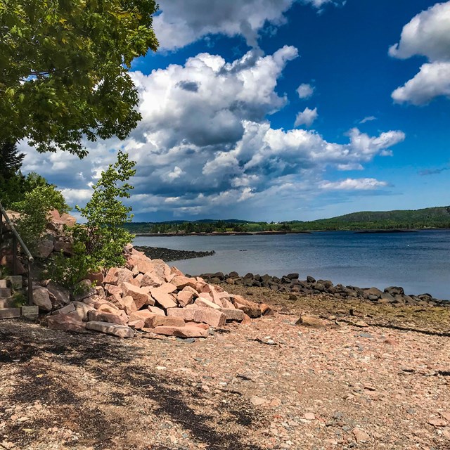 Bottom of stairs on a river's beach 