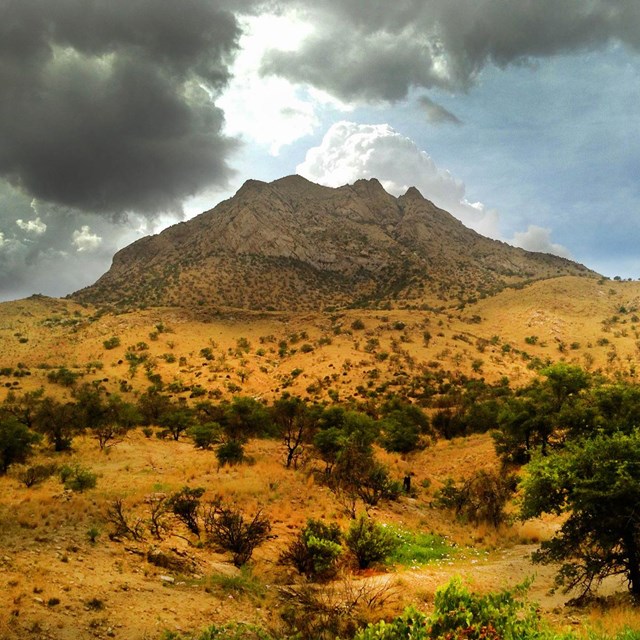 Monsoons building over a mountain peak