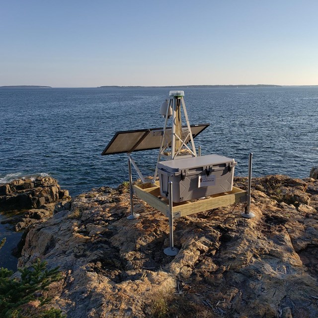 Solar panels near an ocean 