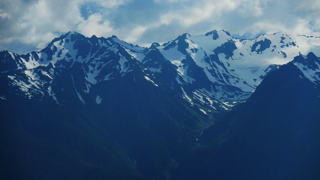 Snowy mountain peaks.