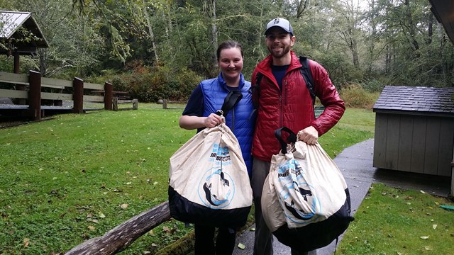 Volunteers help clean marine debris off wilderness beaches