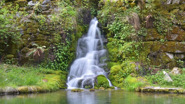 A waterfall of Cave Creek located at the lower pond next to the Chateau Gift Shop.