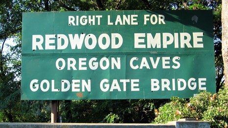 Redwoods, Oregon Caves, and Golden Gate road sign