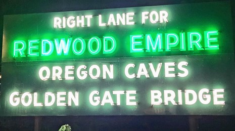 Redwoods, Oregon Caves, and Golden Gate road sign