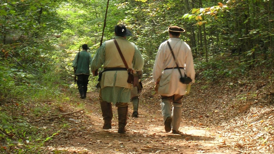 Overmountain Men walking along the Trail