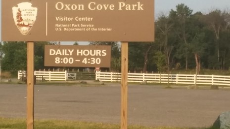 Entrance Sign and Parking Lot