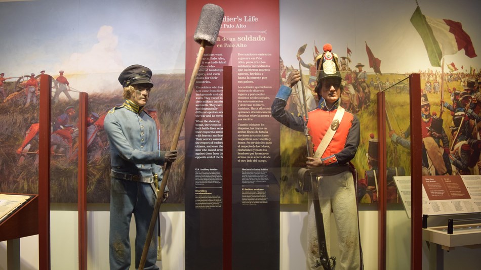 Display of two soldiers. One dressed in 1846 U.S. Army uniform the other Mexican Army uniform