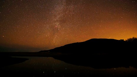 Milky Way and light pollution over a beach in Point Reyes National Seashore