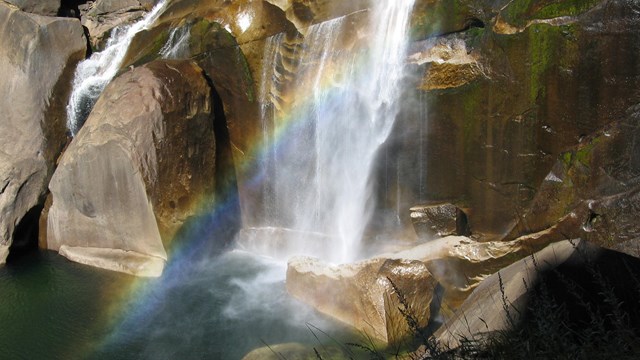 Rainbow in the mist of Vernal Falls in Yosemite National Park