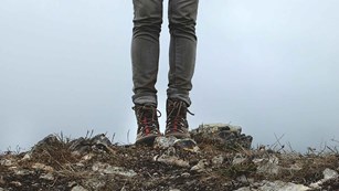 Picture of hiker's legs and boots. NPS photo.