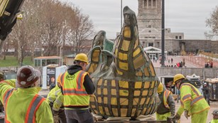 The original torch from the Statue of Liberty is readied to move.