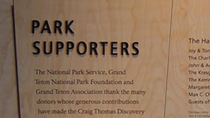 detail of a donor wall thanking park supporters