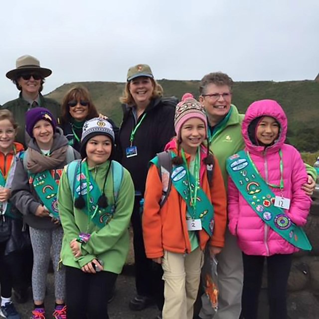 Group of Girl Scouts and National Park Service staff near the Golden Gate Bridge