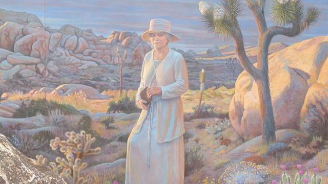 mural depicting Minerva Hamilton Hoyt against the backdrop of Joshua Tree National Park