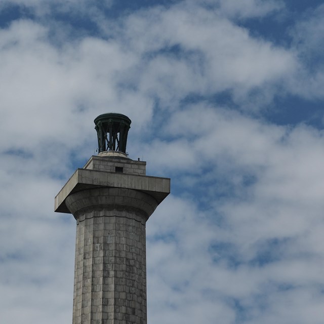 Atop the column of Perry's Victory and international Peace Memorial is a bronze urn. 