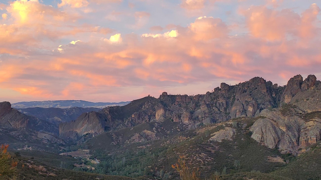 A Pinnacles landscape with an article about summer visitation tips.