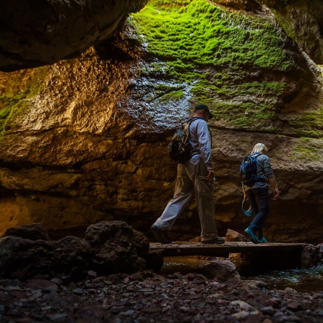 Hiking through Bear Gulch Cave.