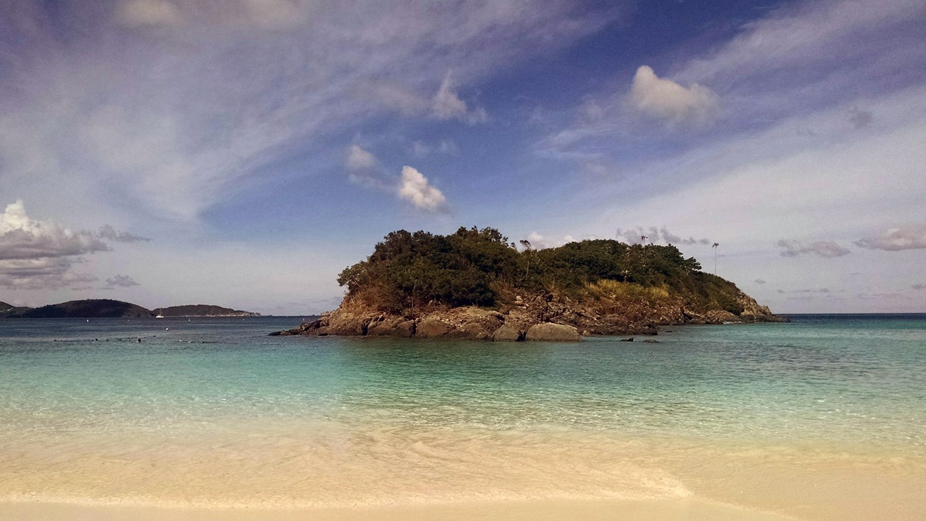 tropical beach with small island