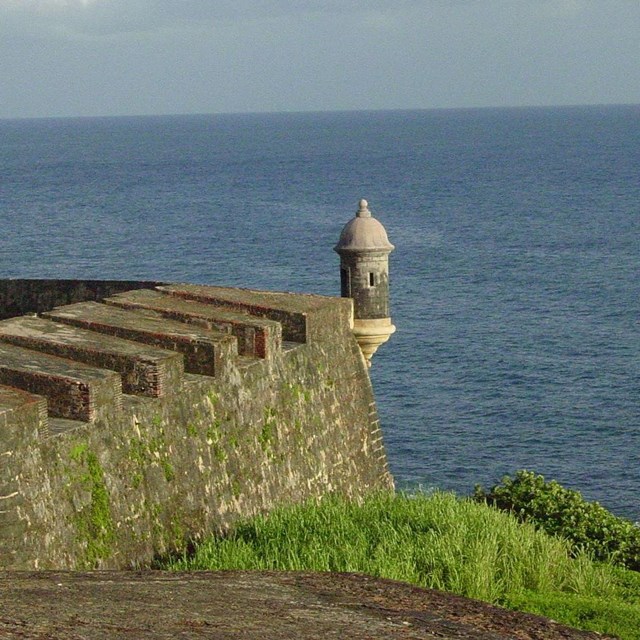 fort wall on left, ocean on right