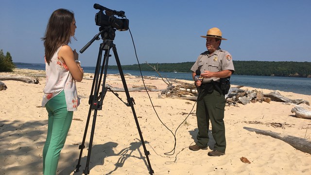 Park Ranger being interviewed by a local reporter
