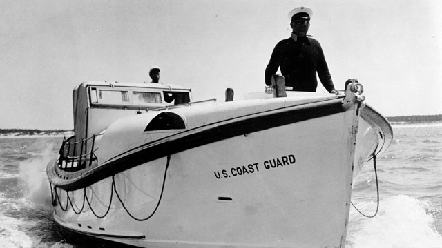 Historic photo of Coast Guard Vessel and her pilot on Lake Superior