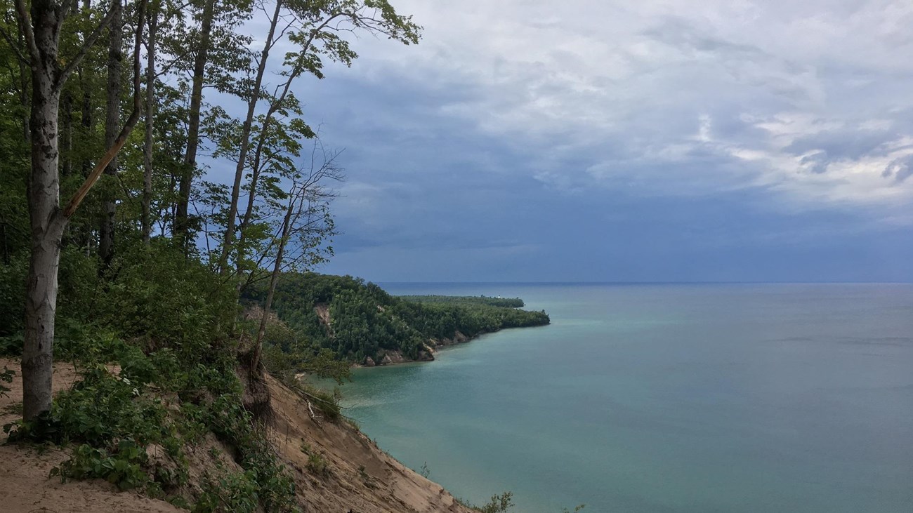 Rain storm moving in the distance across Lake Superior.