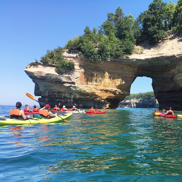Kayaking along the colorful, dramatic Pictured Rocks cliffs.