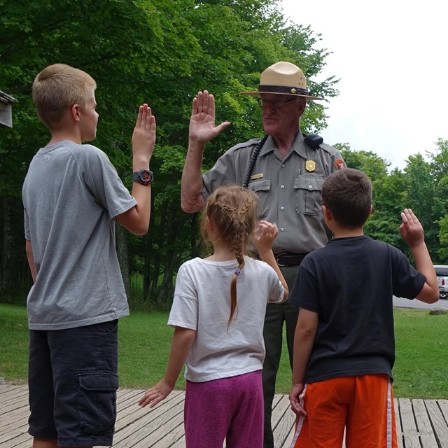 Park Ranger giving the Junior Ranger oath