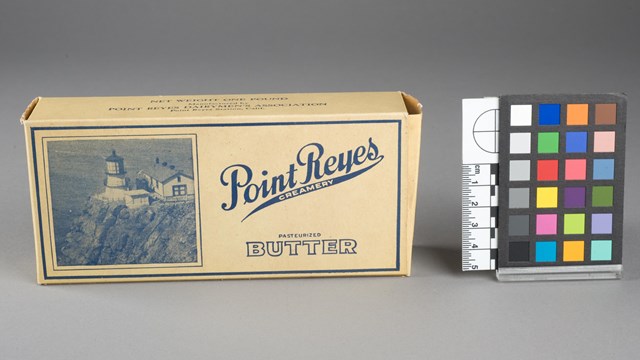 A yellow box labeled Point Reyes Butter featuring a photo of the Point Reyes Lighthouse.