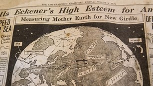 A cartoon map and headlines in the August 9, 1929, edition of the San Francisco Examiner.
