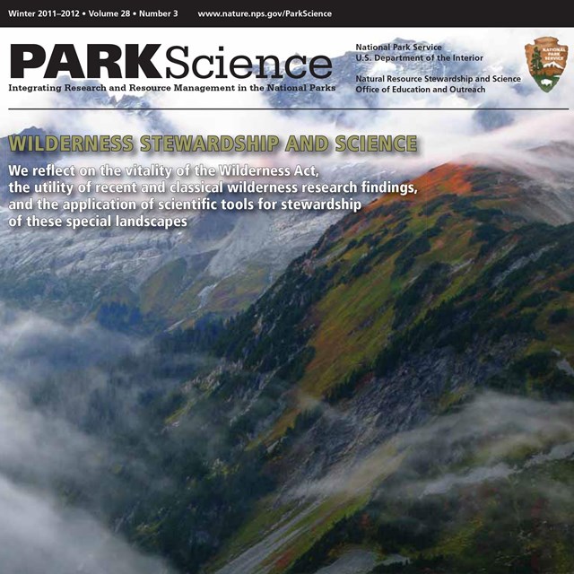 The cover of Park Science's Winter 2011–2012 issue, featuring an image of a cloud-shrouded valley.
