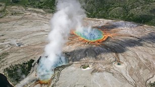 Aerial view of rainbow colored hot springs. 