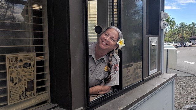 A ranger greets you from the entrance station